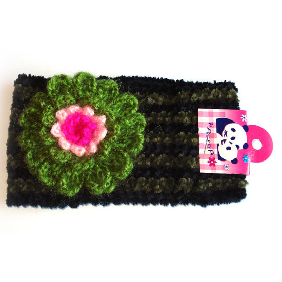 Schwarzes gestreiftes Haarband mit grün-rosa Blume